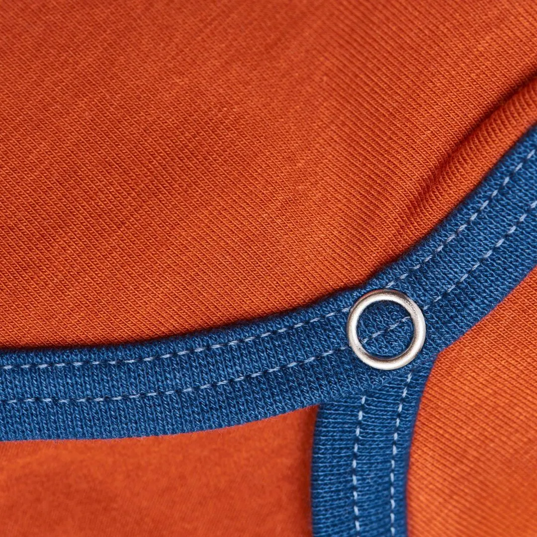 Long-sleeve baby body "Rust/Indigo"